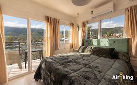Suites de Lujo con Vistas, Patio y Parrilla